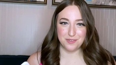 Busty curly brunette with big boobs fucks on couch