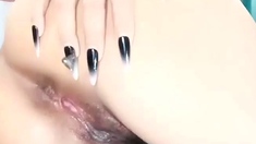 Japanese teen has her trimmed pussy toyed