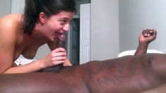 Tan stud gives a POV blowjob to his big cock