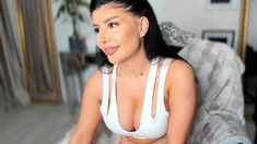 Busty curly brunette with big boobs fucks on couch