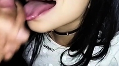 Japanese teen sucks and takes a cumshot in her mouth