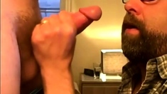 Bearded guy takes two loads to the face from his buddy