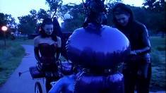 Public training of latex-clad femdom slaves gets really kinky